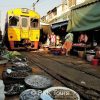 Seafood stall beside the railway track at the famous Railway market. See the train passing on our private railway market tour from Bangkok.