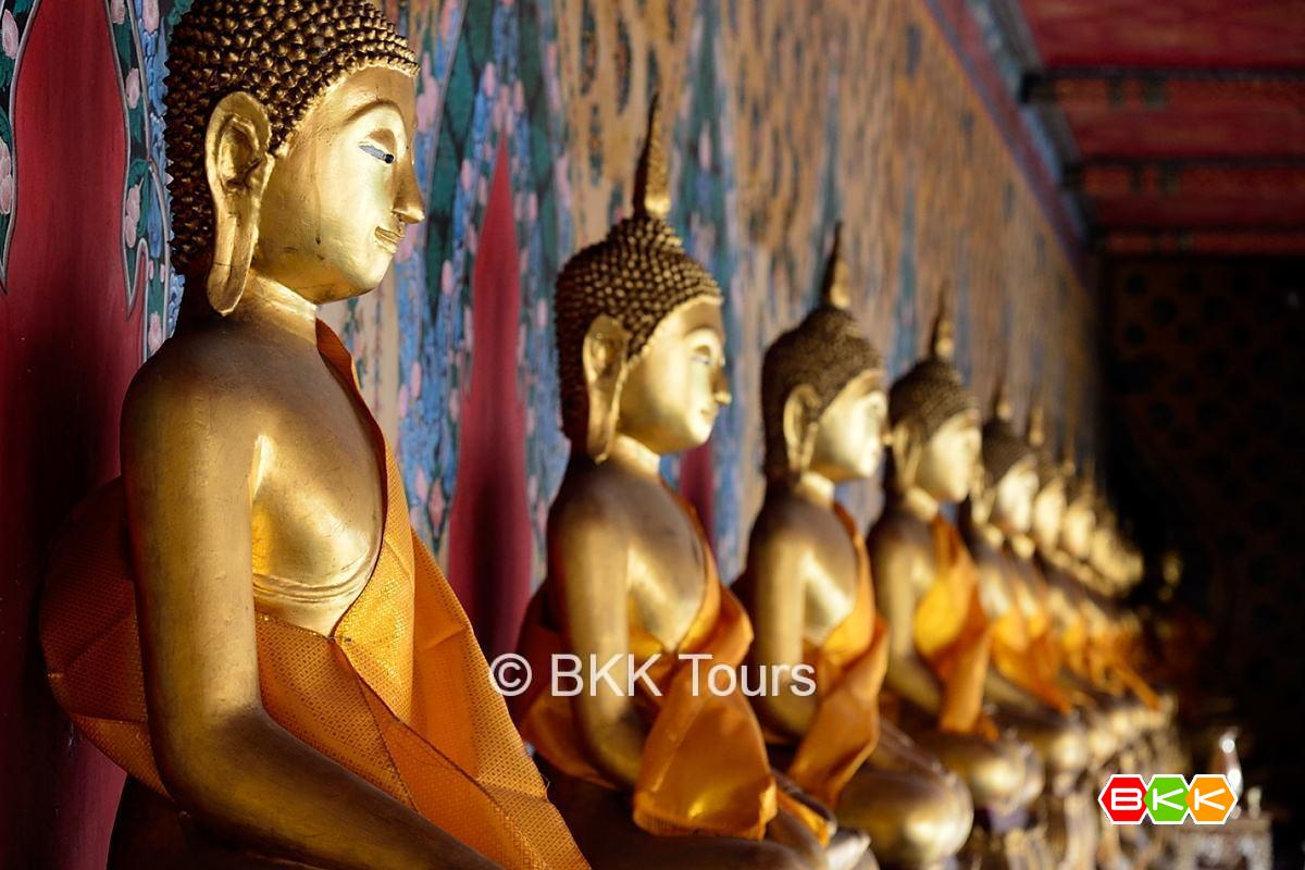 Buddha images around Wat Arun or the Temple of Dawn's ordination hall. Visit Wat Arun on our private tours in Bangkok.