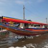 Cruising along Chao Phraya River on Bangkok canal tour