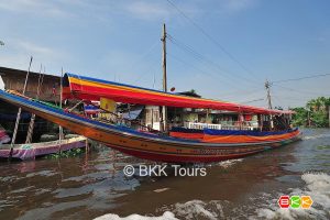 Explore local life on a canal tour in Bangkok by private long-tailed boat. See old wooden houses on stilts, greener areas, and local life along the canals.