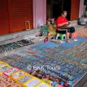 Vendor selling handmade accessories in Chinatown