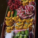Local fruits for sale on a boat at Damnoen Saduak floating market
