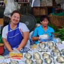 Stall selling vegetable and steamed mackerels at Khlong Toey Market