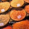 Dried shrimps of different sizes, tastes, and colors at the famous Railway market in Samut Songkram