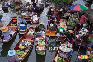 Visit Tha Kha floating market on a tour from Bangkok ✅. One of the last traditional floating markets in Thailand, it is best visited in the weekend.