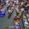 Vendors selling fresh produce from rowing boats at Tha Kha floating market
