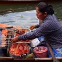 Grilled pork on sticks at Tha Kha floating market