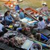 Local vendors at Tha Kha floating market, one of the last remaining authentic floating markets.