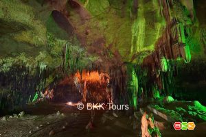 Visit Tham Khao Bin cave on a tour from Bangkok ✅. The cave is separated into eight rooms, it has impressive stalactite and stalagmite formations.