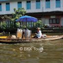 A boat selling coconut ice cream on the canals of Bangkok